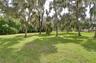 Private outdoor oasis surrounded by acreage.