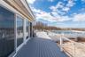 Deck featuring a fenced in pool and fence