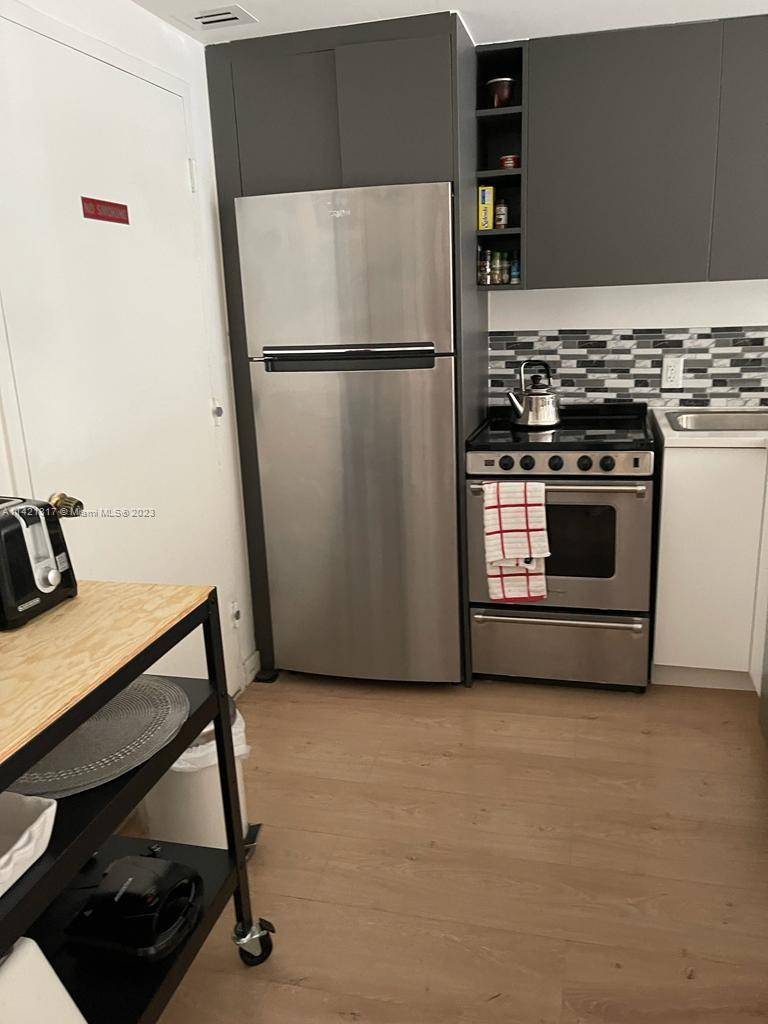 Fully renovated apartment with new kitchen and bathroom, new floors and impact windows.