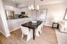 Bright, functional kitchen with open flow for entertaining.