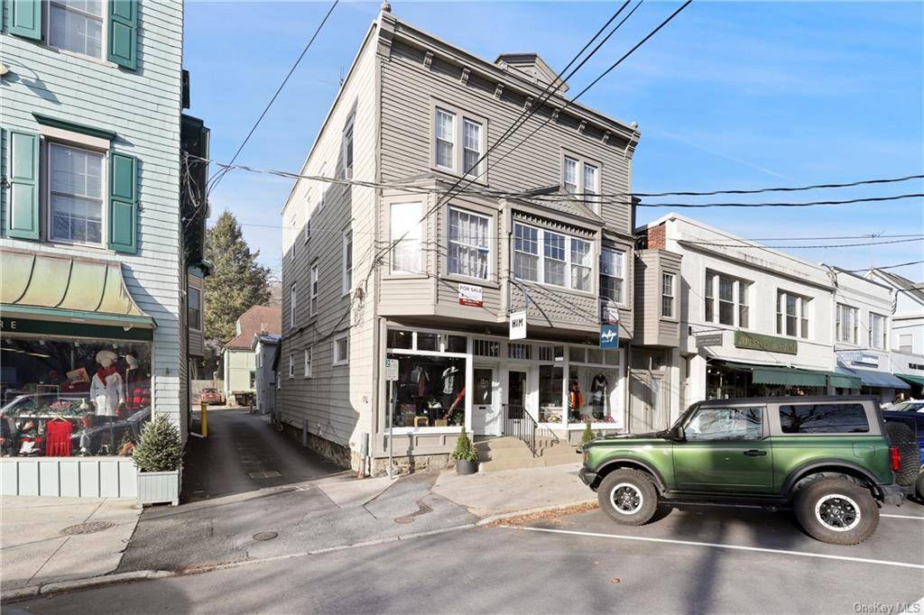 Charming 33x52, 3 story building on Katonah Avenue in high visibility center of village along foot traffic sidewalk.