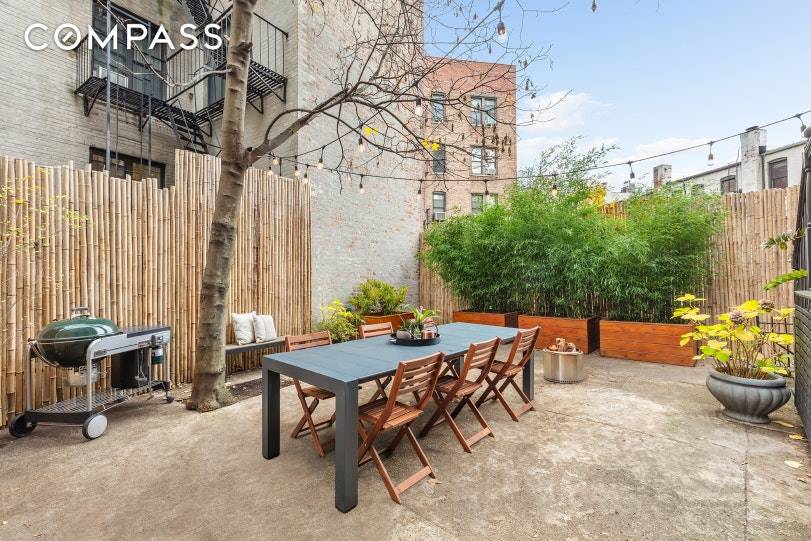 Lush public and private outdoor space surrounds this beautifully updated two bedroom, one bathroom Prospect Heights co op featuring a massive private yard and direct access to Grand Army Plaza ...