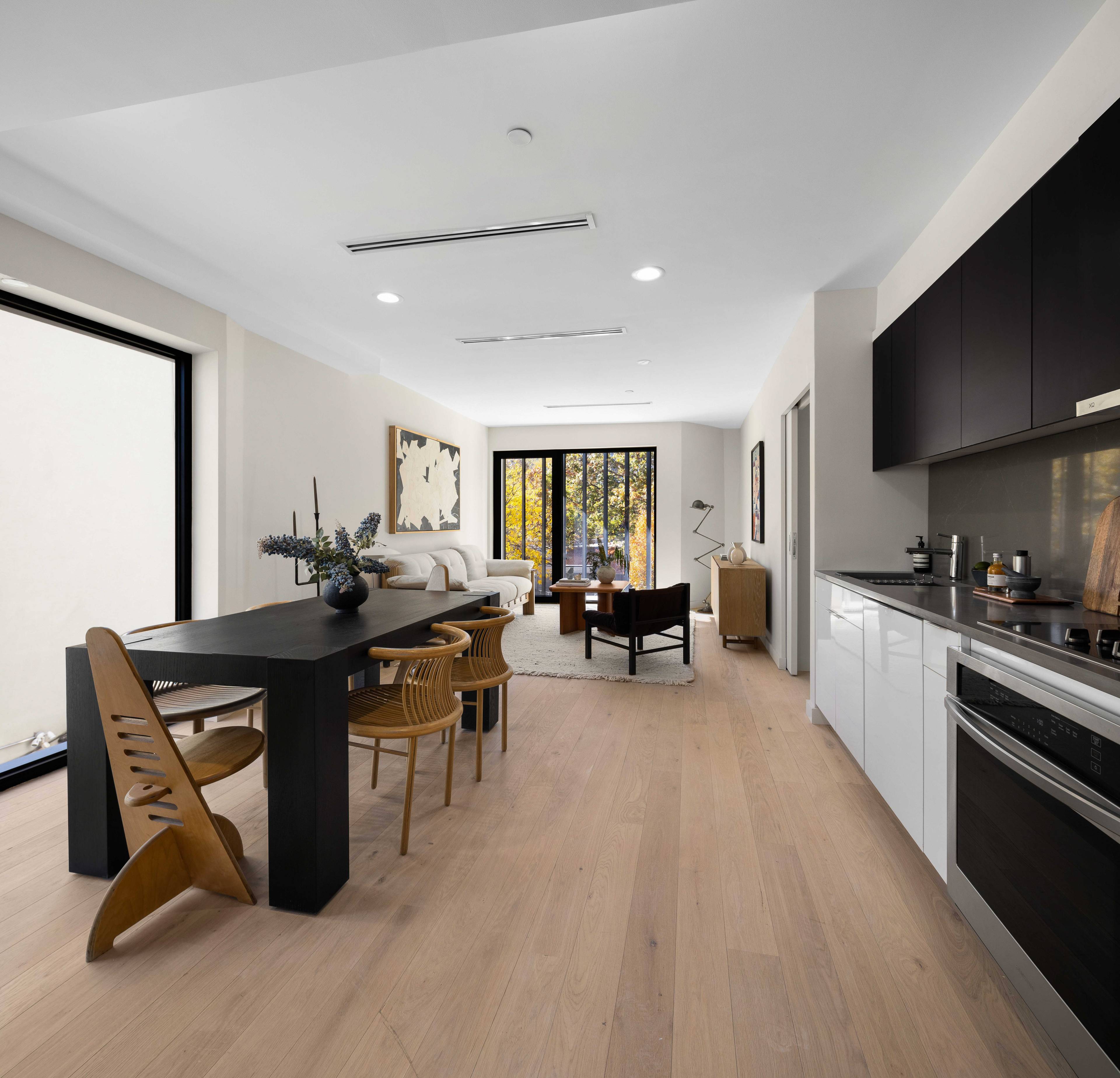 A brand new floor through condo nestled around the corner from Fort Greene Park, this pristine 2 bedroom, 2 bathroom home is a portrait of contemporary minimalism and urban design.