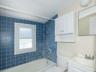 Bathroom featuring vanity and tub / shower combination