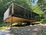 Weclome to a new way of living in storage containers. The windows are all triple pane and let in a lot of light.