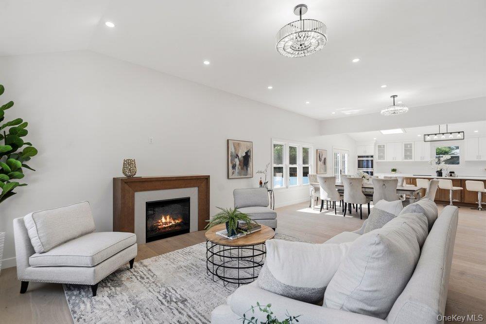 Open-concept Home with Vaulted Ceilings, 7 inch Wide Plank Natural Wood European White Oak Floor In The Main Living areas.