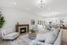 Open-concept Home with Vaulted Ceilings, 7 inch Wide Plank Natural Wood European White Oak Floor In The Main Living areas.