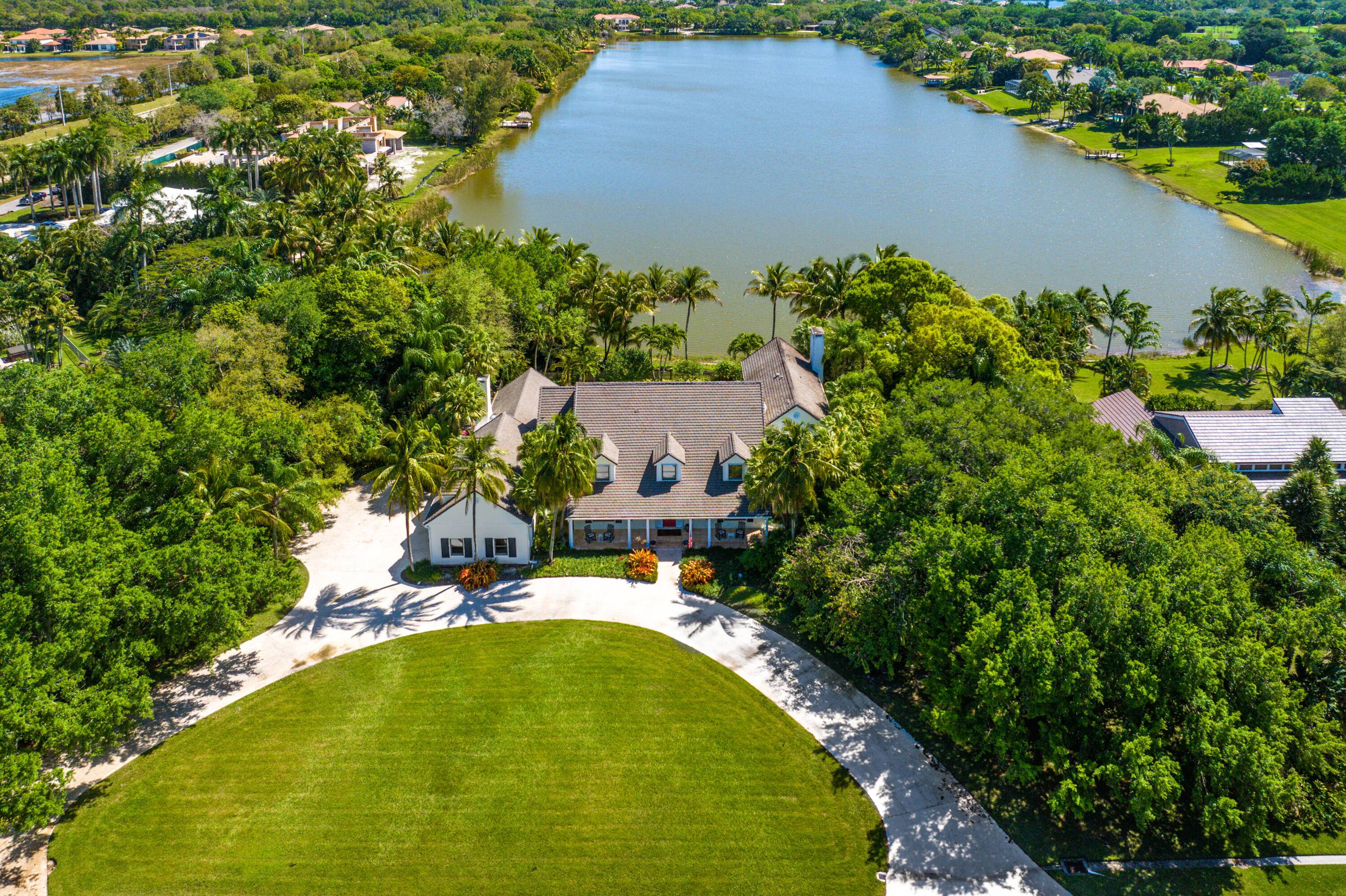 Built as a ''Forever Home'' on a gorgeous acre of lakefront property, this 6600 square foot, 7 bedroom oasis boasts a secluded paradise for the entire family to enjoy.