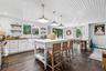 Kitchen featuring open shelves, tasteful backsplash, pendant lighting, dark wood-style flooring, and recessed lighting