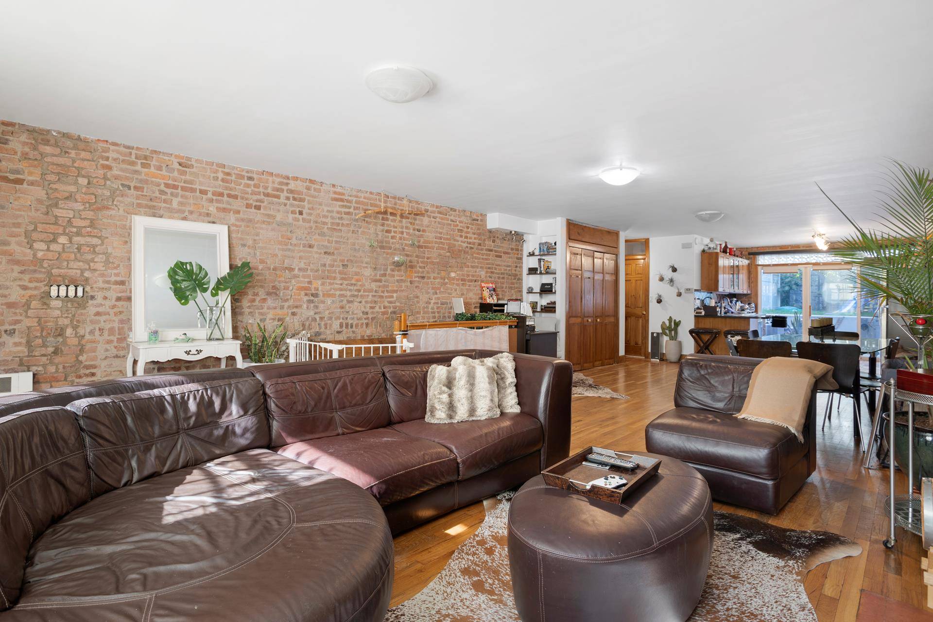 This stately Carroll Gardens four family Brownstone is built 19 feet wide by 44 feet deep, on a huge 100 foot lot.