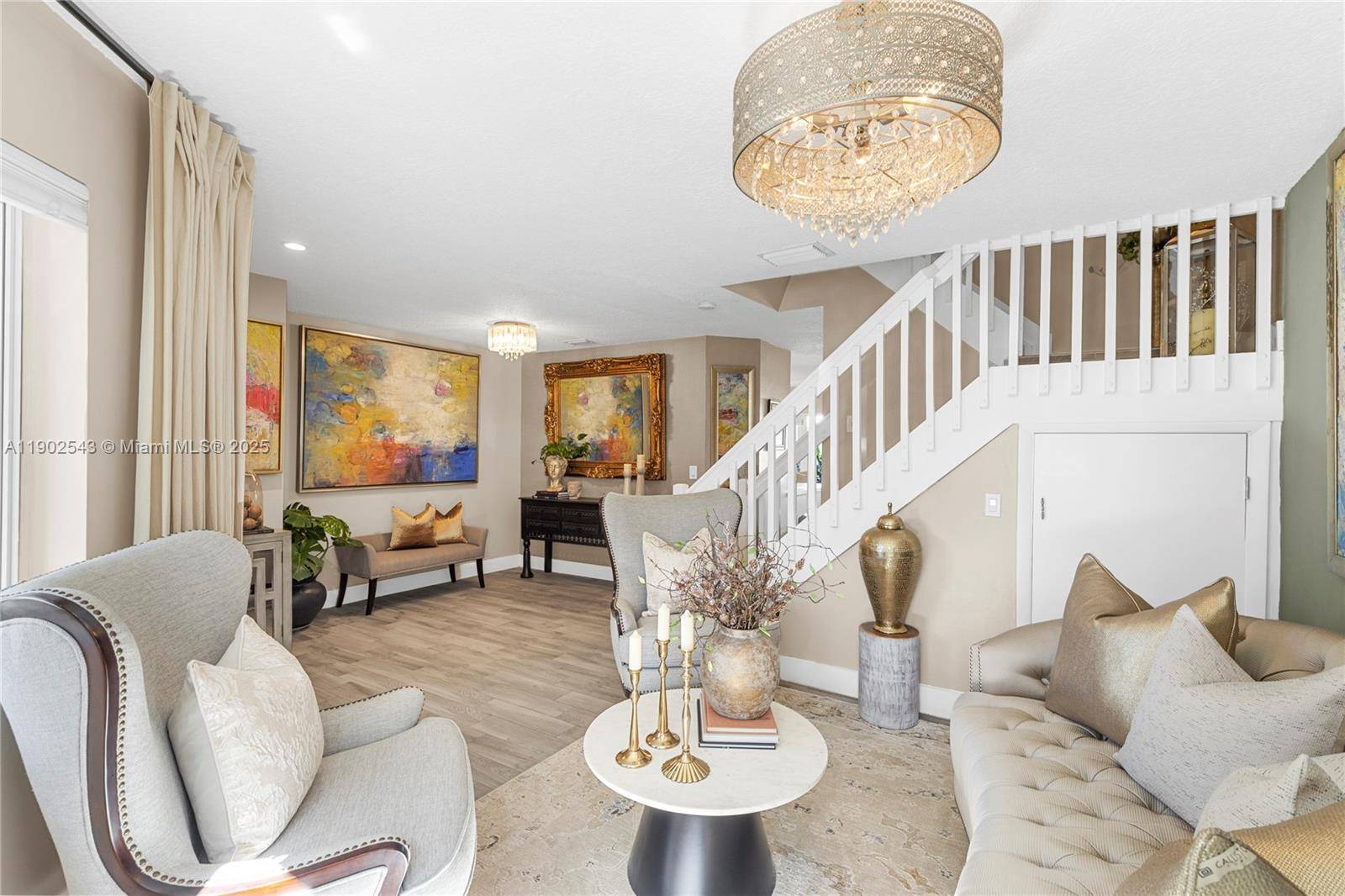 Welcome to this beautifully renovated townhouse situated in the highly sought after gated community of Malibu Bay at Chapel Trail.