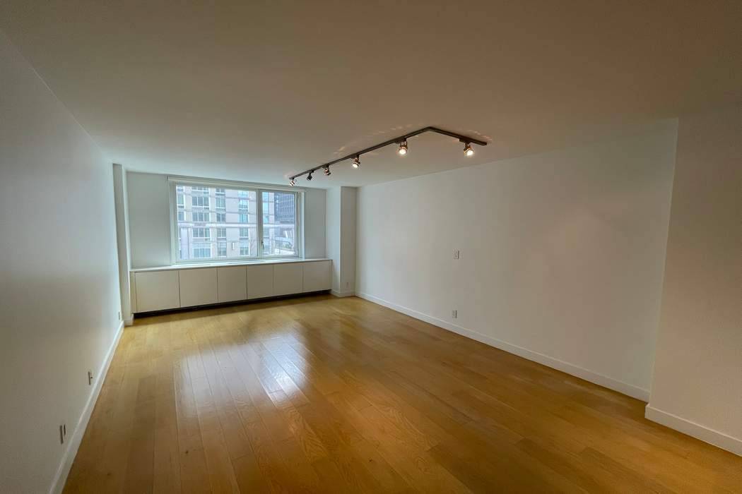 Indulge in the exquisite ambiance of this one bedroom sanctuary nestled within a prestigious doorman building, centrally positioned in the vibrant heart of Manhattan at Fifty Third and Eighth Ave.