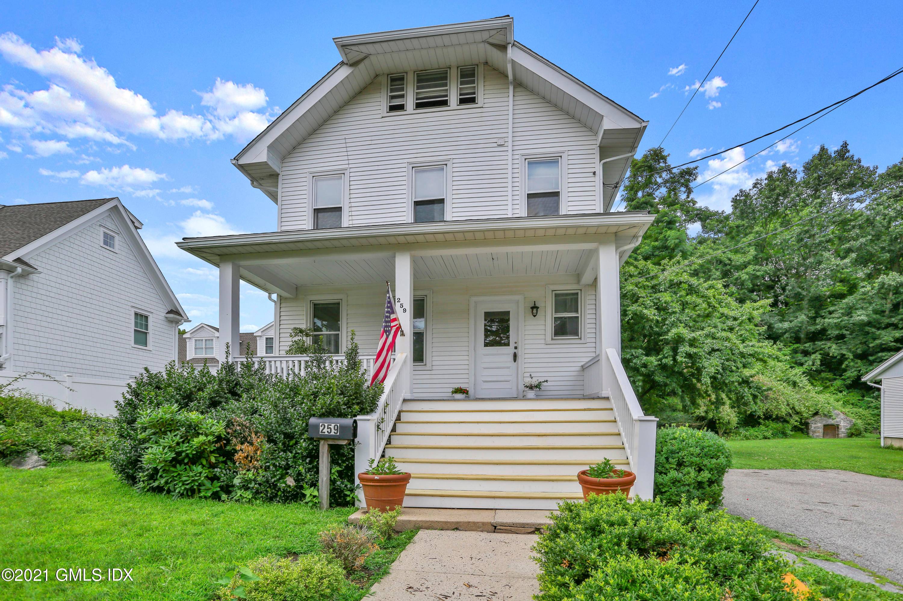 Classic colonial with a fabulous front porch in a convenient downtown location.