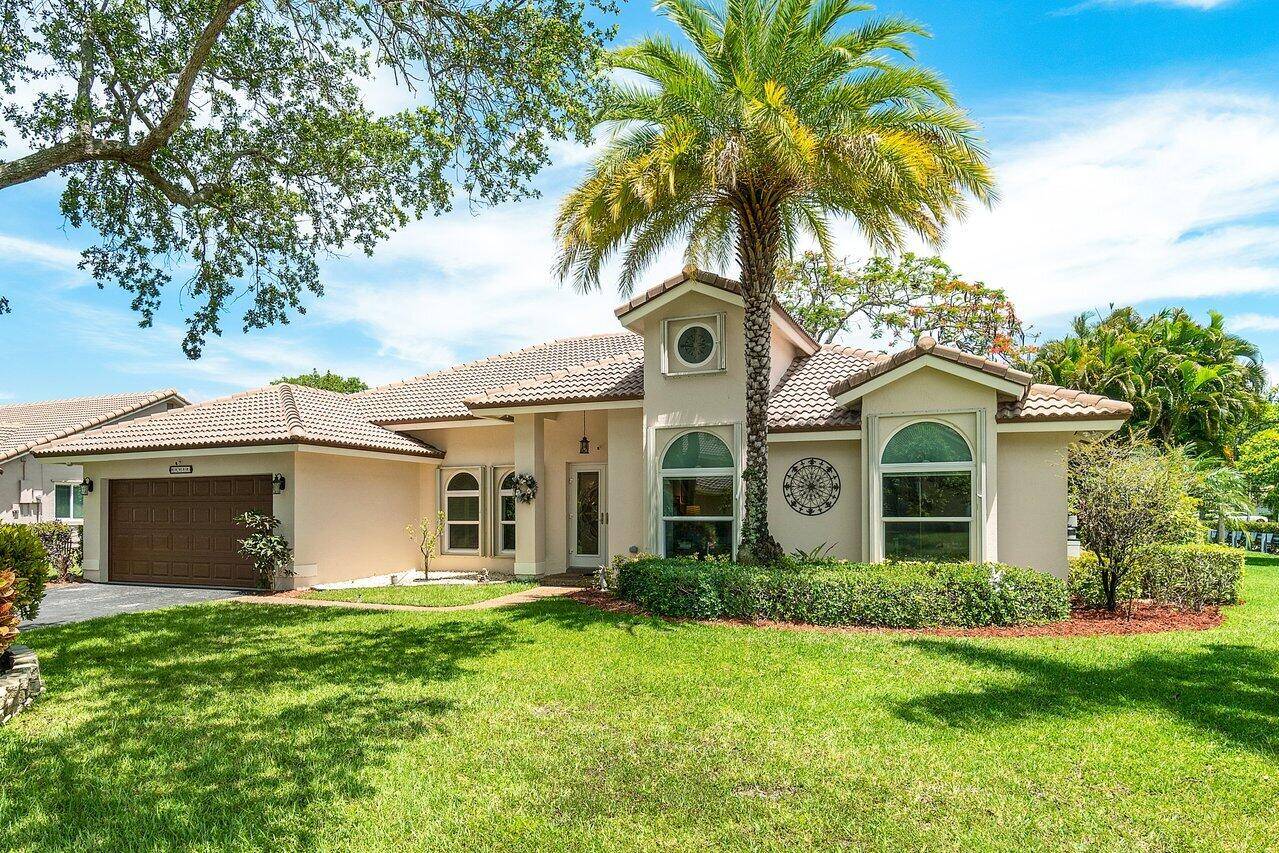 This highly upgraded home is sited on an amazing 13, 516 SF, waterfront, corner lot and features a gorgeous pool with large covered porch that overlooks a tranquil waterway.