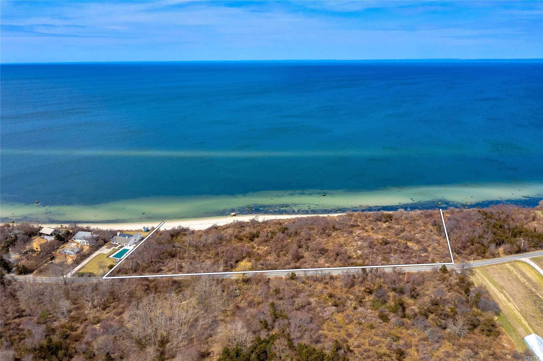 This Long Island Sound waterfront lot, on 8 acres, offers an incredible 823' of beach water frontage.