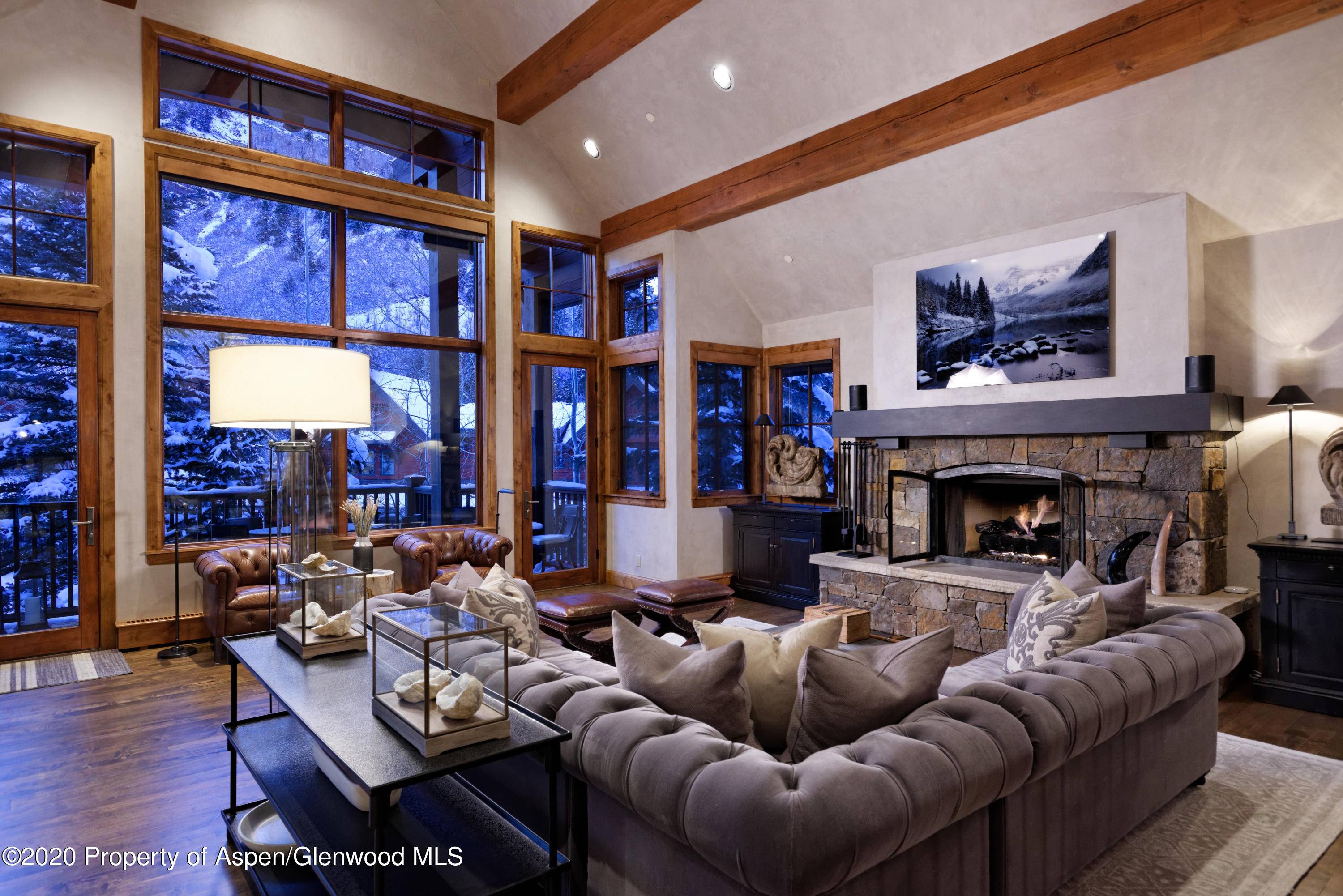 Aspen Highland's ski in ski out luxury townhome features five ensuite bedrooms and two separate entertaining areas.