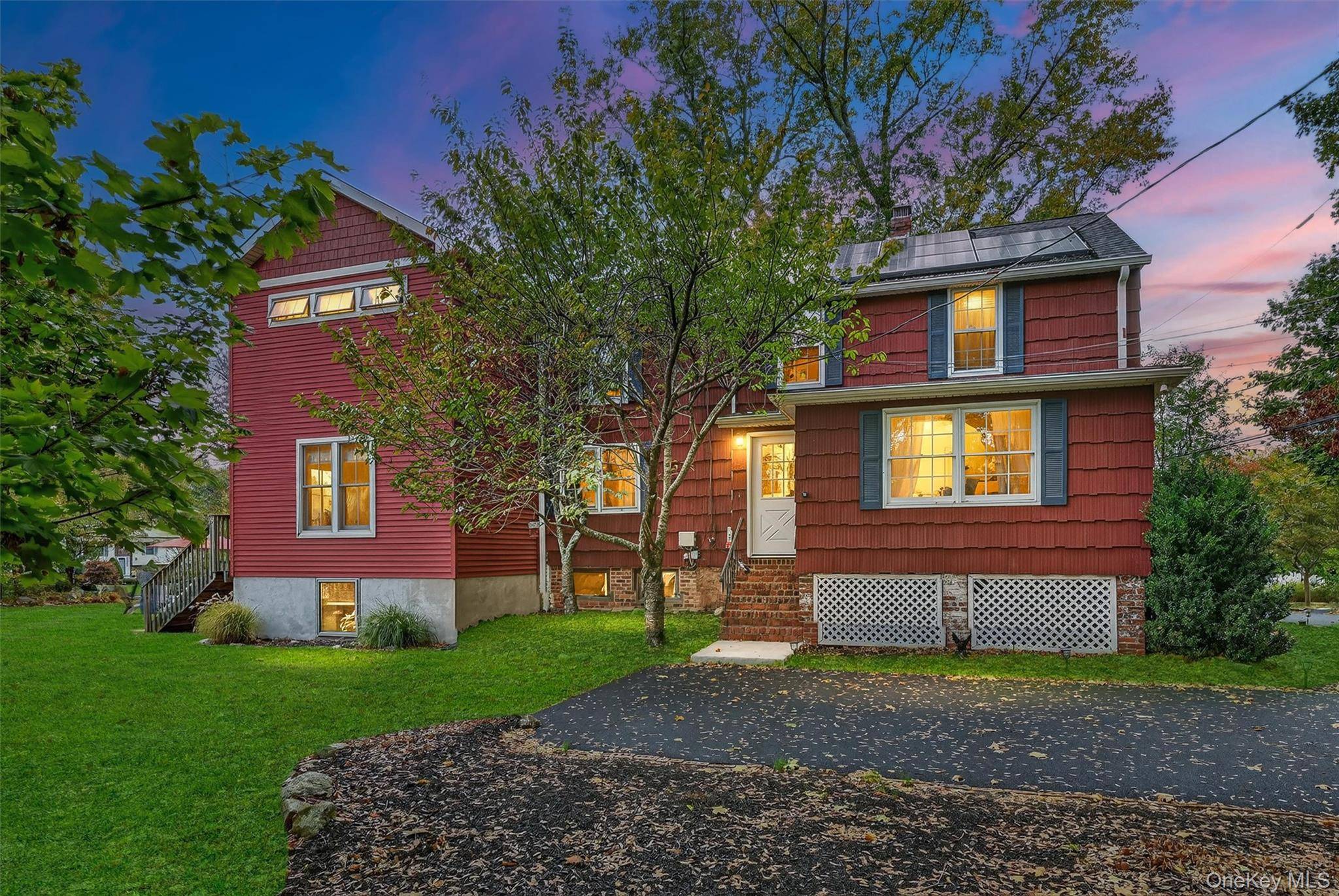 Tucked away on a quiet private road in Congers and within the sought after Clarkstown School District, this distinctive 4 bedroom Colonial blends old world charm with architect designed updates.