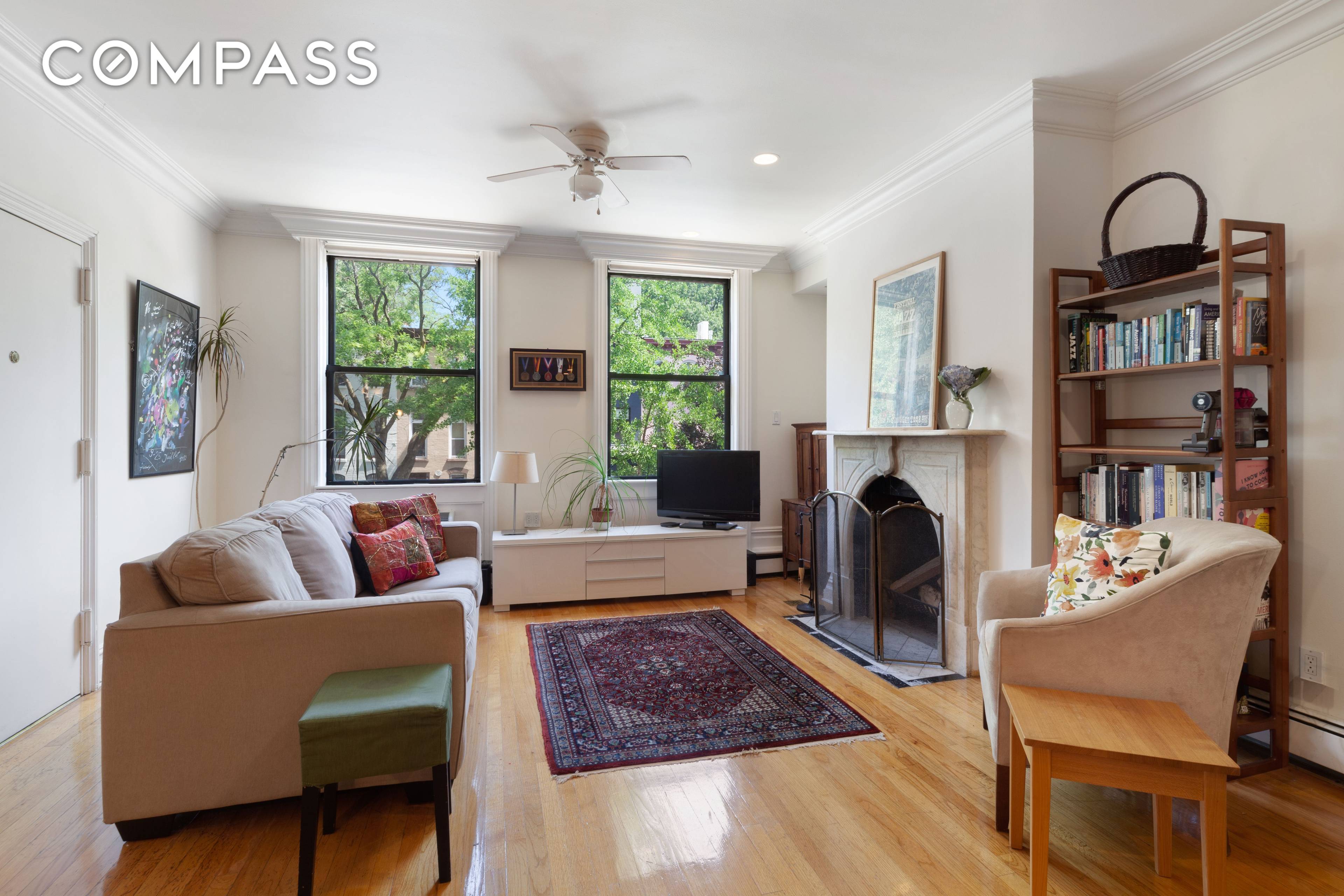 This charming 2BR townhouse parlor floor through in Boerum Hill features gracious proportions, high ceilings and charming details, including hardwood floors, wood burning fireplace with marble mantel amp ; crown ...