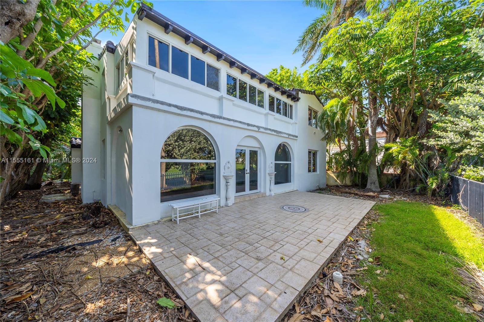 TWO STORY HOME ON THE LA GORCE COUNTRY CLUB GOLF COURSE IN THE HEART OF MIAMI BEACH.