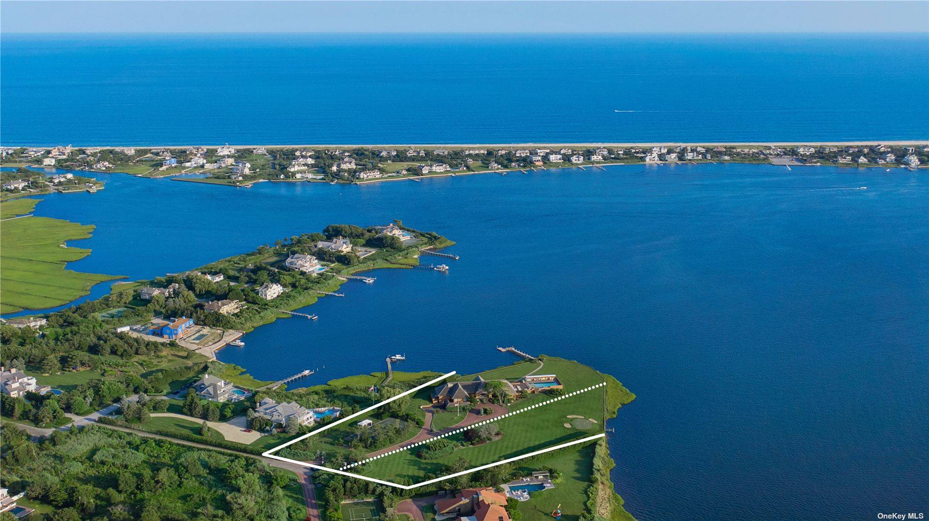 An Impressive And Premier Waterfront Estate Designed By Renowned Architect, Norman Jaffe, In Quogue On The Desirable Quantuck Bay.