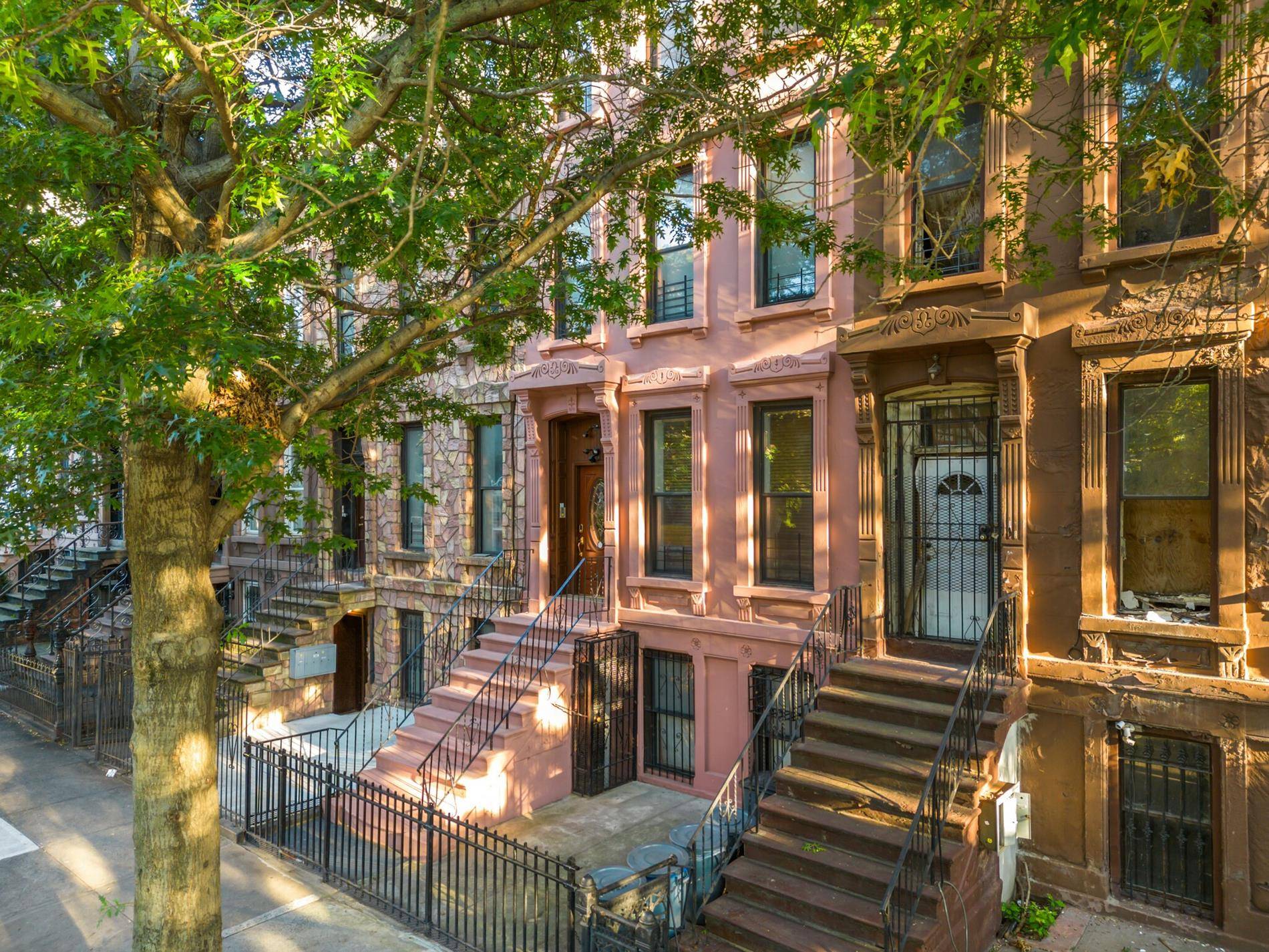A quintessential 19th century Brooklyn townhouse, four storied, four family with Certificate of Occupancy.