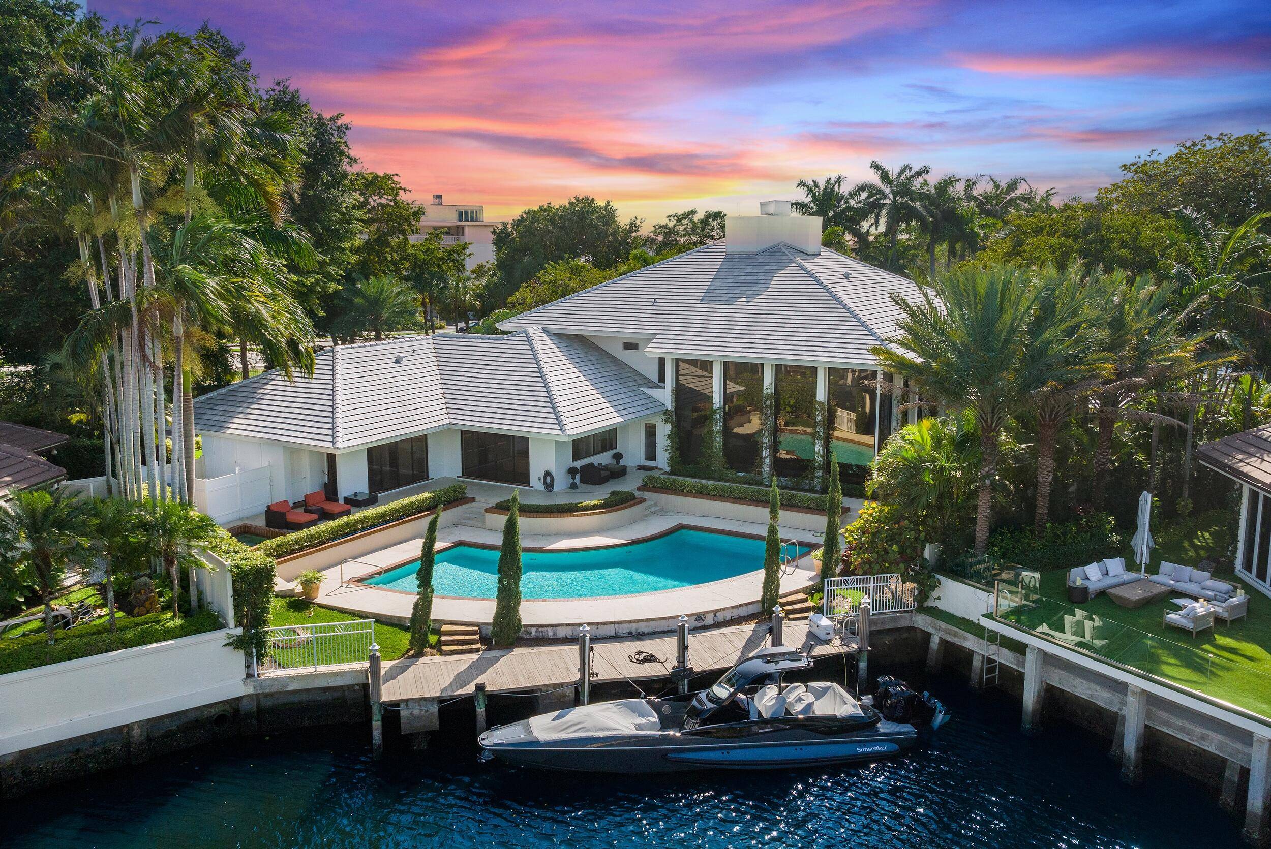 The ultra exclusive community of The Sanctuary sets the picturesque backdrop for this contemporary waterfront stunner.