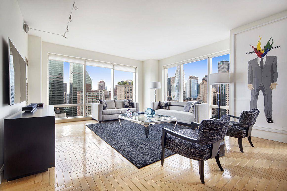 South West Corner 2 Bedroom with 3 Baths Residence has spectacular Iconic City and East River views.