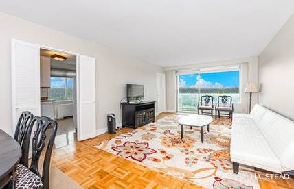 Corner, oversized Jr. 4 with terrace has stunning south and western views of the GW Bridge, Hudson River, and Palisades.