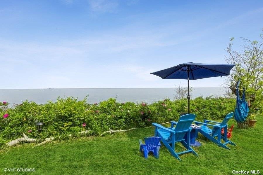 Relax and enjoy this Beal Tra ll vintage beach house on the Long Island Sound.