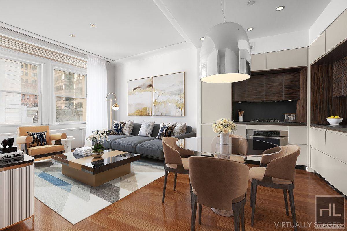 As you walk through the front door, the first thing you'll notice are the soaring 14 foot ceilings that give the apartment a sense of grandeur and open space.