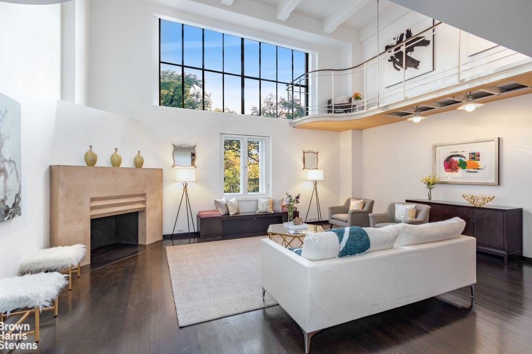 This sophisticated, timeless duplex in the coveted Gainsborough Studios enjoys direct, unobstructed, and engaging views of Central Park from double height windows.