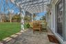 View of patio featuring a pergola and outdoor dining