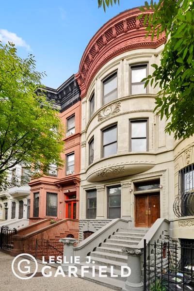 Located on a picturesque tree lined block, 117 West 118th St is a unique 20 foot wide townhouse built by architect Alfred H.
