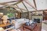 A cozy Wood burning stone fireplace for seasonal enjoyment