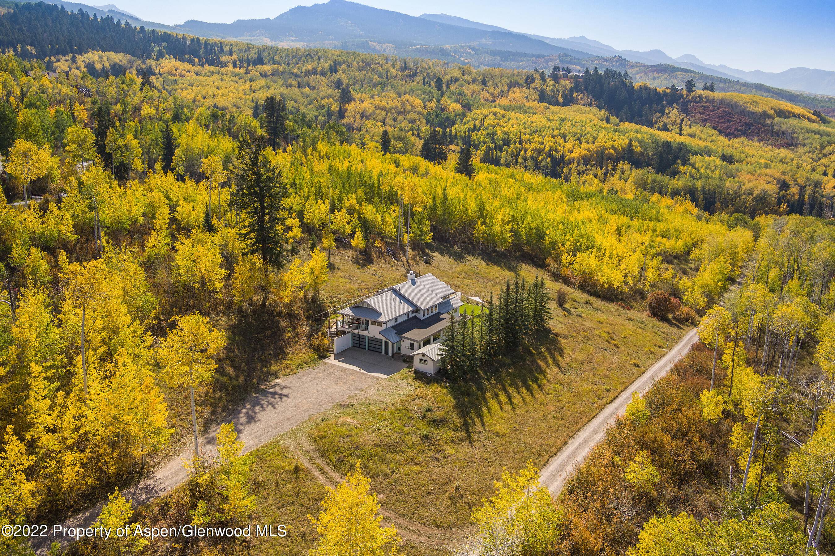 Located just minutes from Aspen, this coveted West Buttermilk sanctuary sits on 36.