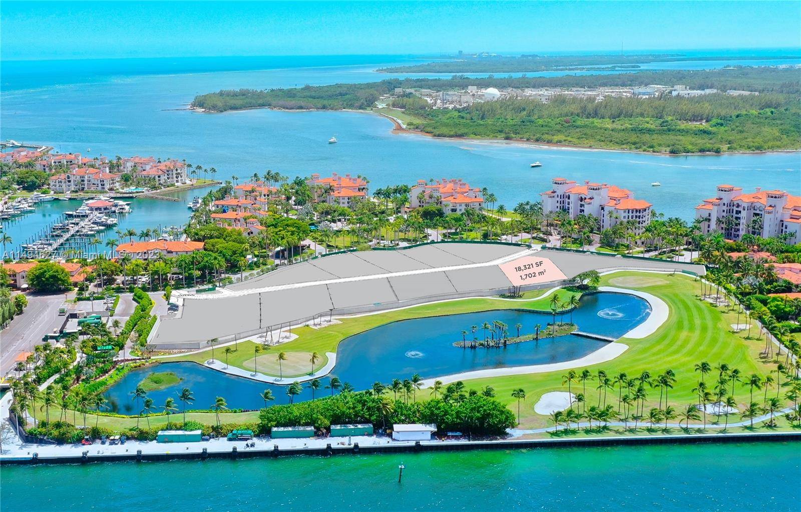 DEVELOP YOUR OWN DREAM ESTATE WITH BAY VIEWS ON ONE OF THE ONLY RARE LOTS ON THE PRIVATE SECURE FISHER ISLAND !