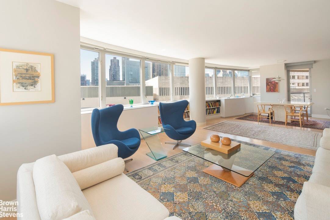 Located on the 9th floor, this spacious 2, 157 square foot three bedroom, three and one half bathroom home offers the best of New York City living.