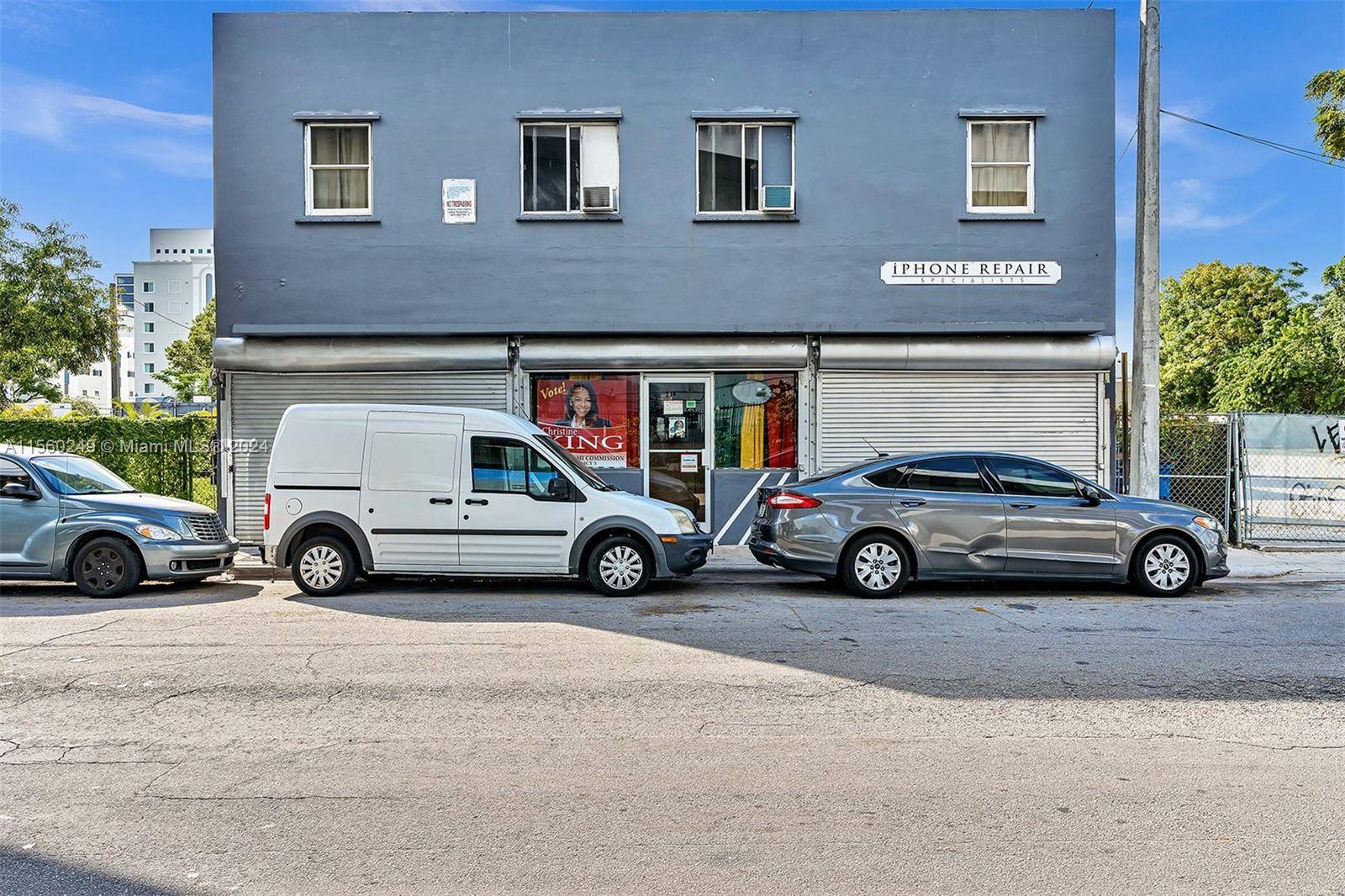 Overtown, Centrally located 2 story self standing building with three 3 For Lease available spaces downstairs which can be used for multiple types of businesses.