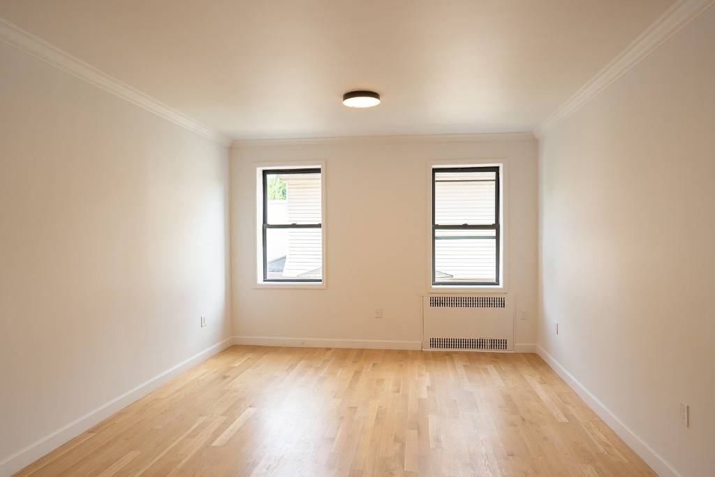 This is a beautiful, totally renovated yes, everything is BRAND NEW, spacious, 1 bedroom corner apartment on the 2nd floor of a well maintained 6 story pre war elevator building.