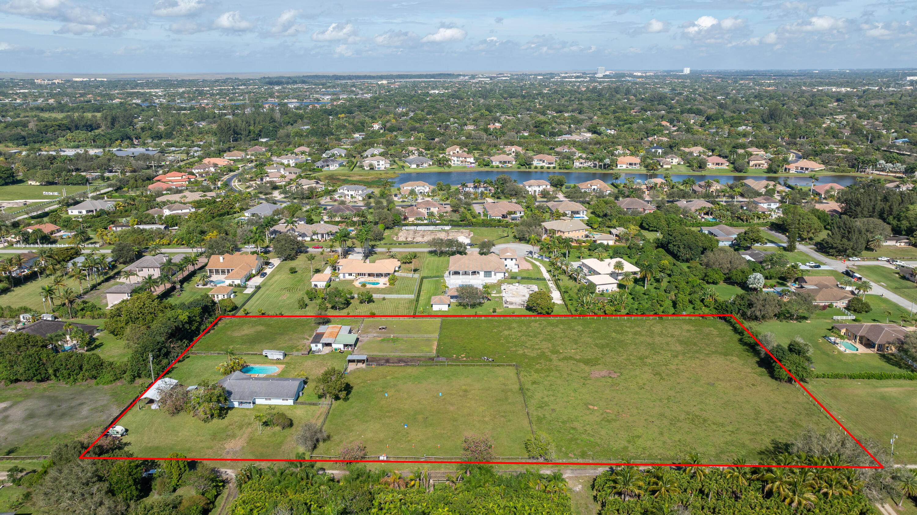 Nestled in the highly sought after area of Davie, Florida, this stunning property sits on a private road, without a HOA offering you the epitome of exclusivity and privacy on ...