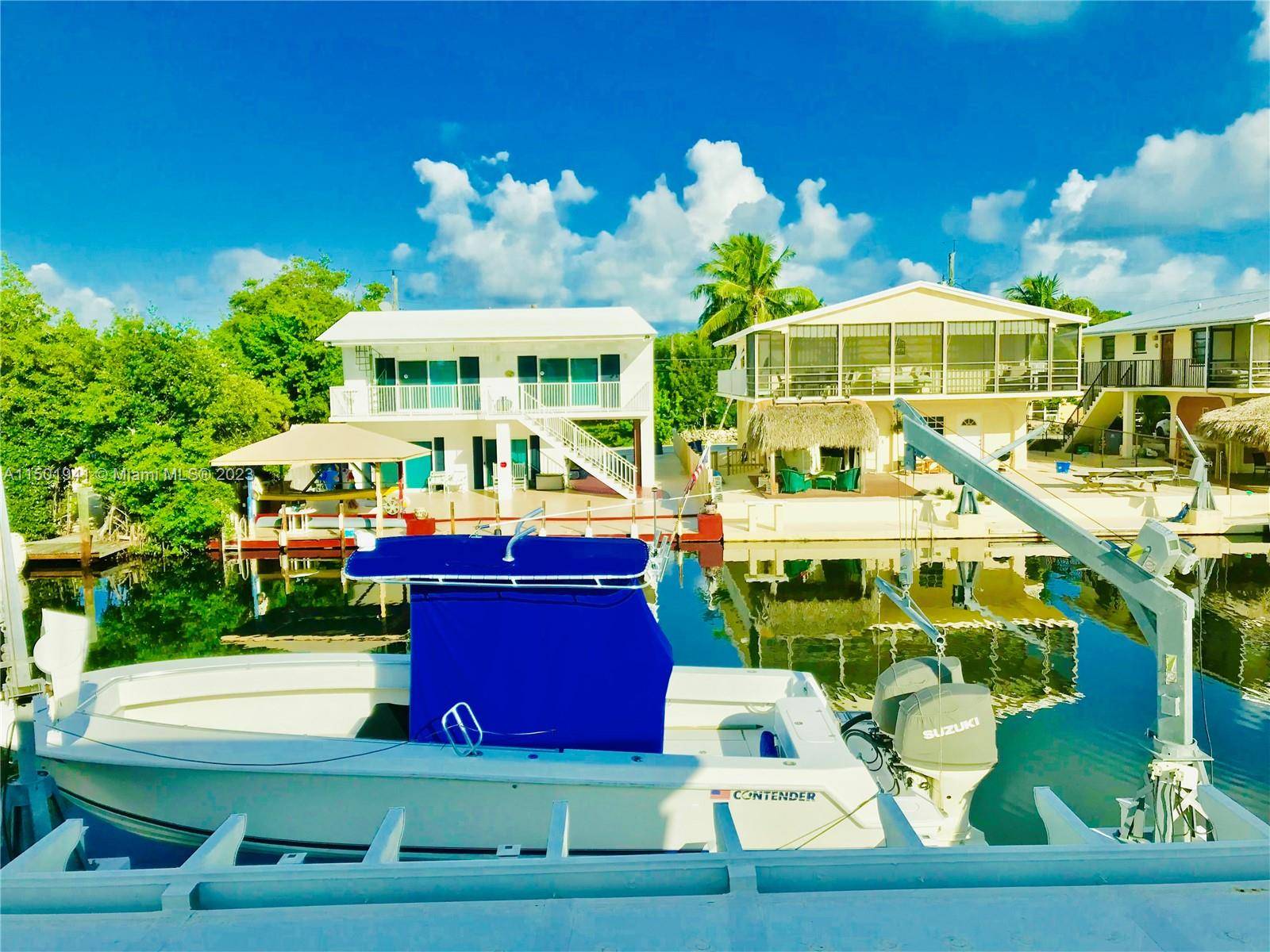 This UNIQUE and rarely to be found property is 1, 496 SF living space, 3bed 2baths, waterfront direct bay access, private concrete dock for a 30 FT boat with amazing ...