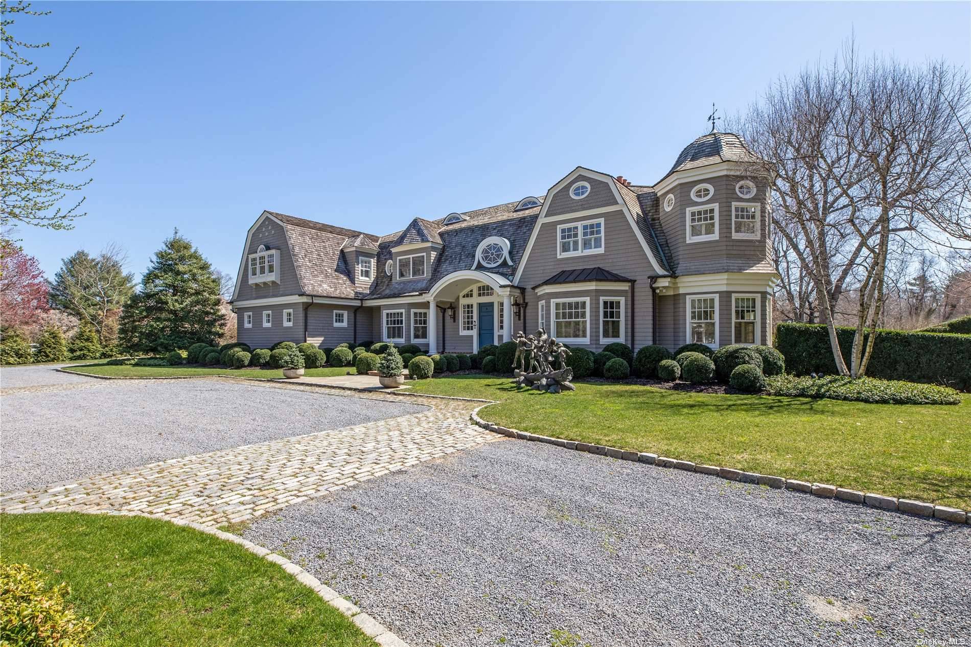 Set on 3 lush rolling acres, this prodigious Old Brookville estate boasts a distinguished address on the North Shores coveted White Gate Drive.