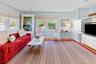 LIVING ROOM WITH WIDE-SCREEN TV