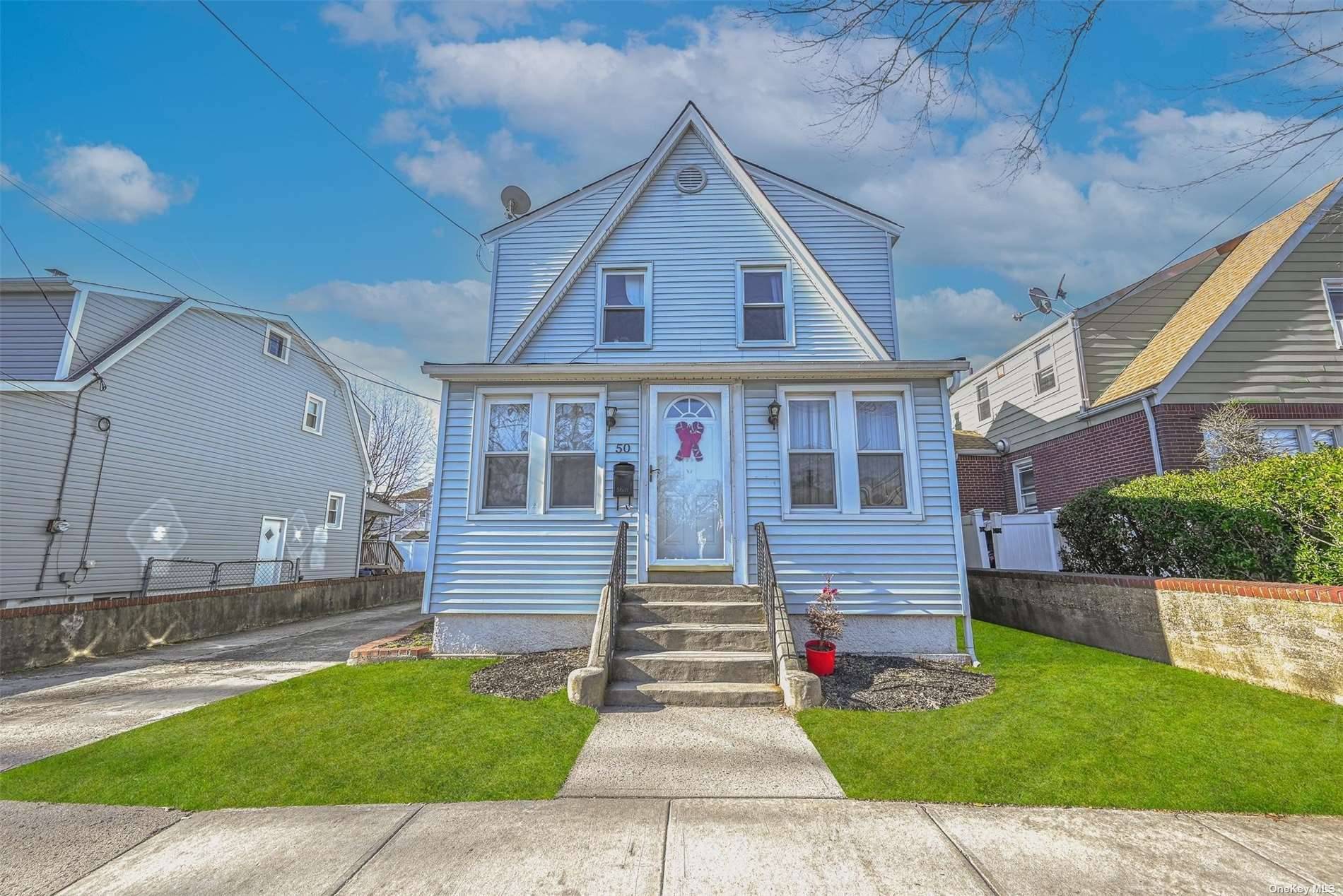 Welcome to 50 McKee St, Floral Park, NY 11001 a beautifully Colonial renovated home that seamlessly blends modern comfort with timeless charm.