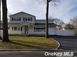 Beautiful 4 Bedroom Colonial with Rocking Chair Front Porch Wood Rear Deck.