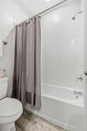 View of Shower/Bath Combo in Jack in Jill bathroom