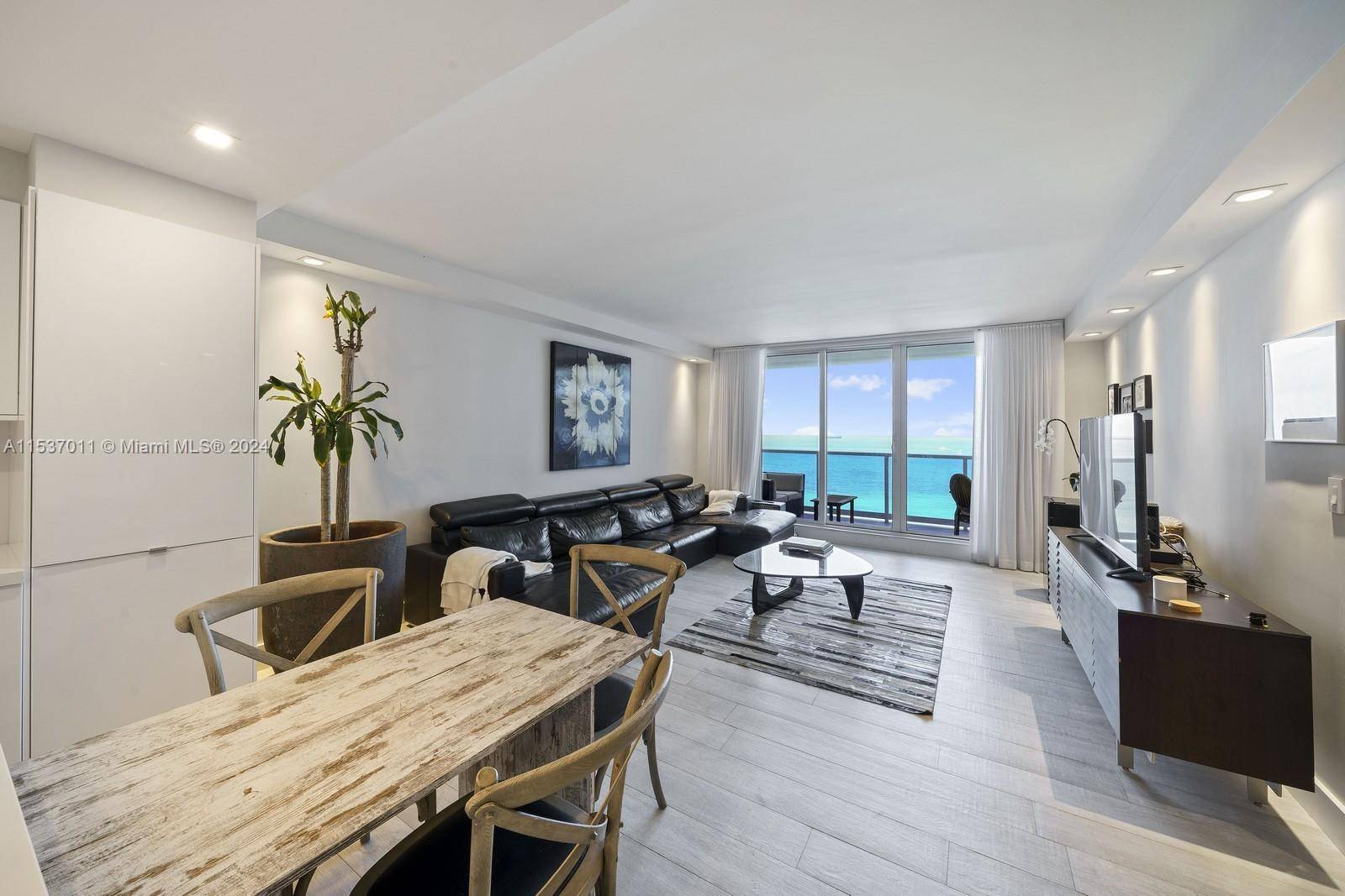 This gorgeous oceanfront unit was combined creating an expansive and luxurious residence with stunning views of the ocean.