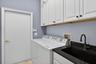 Laundry Room with tons of storage cabinets