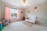 Larger Bedroom 2 located away from other bedrooms adding privacy.