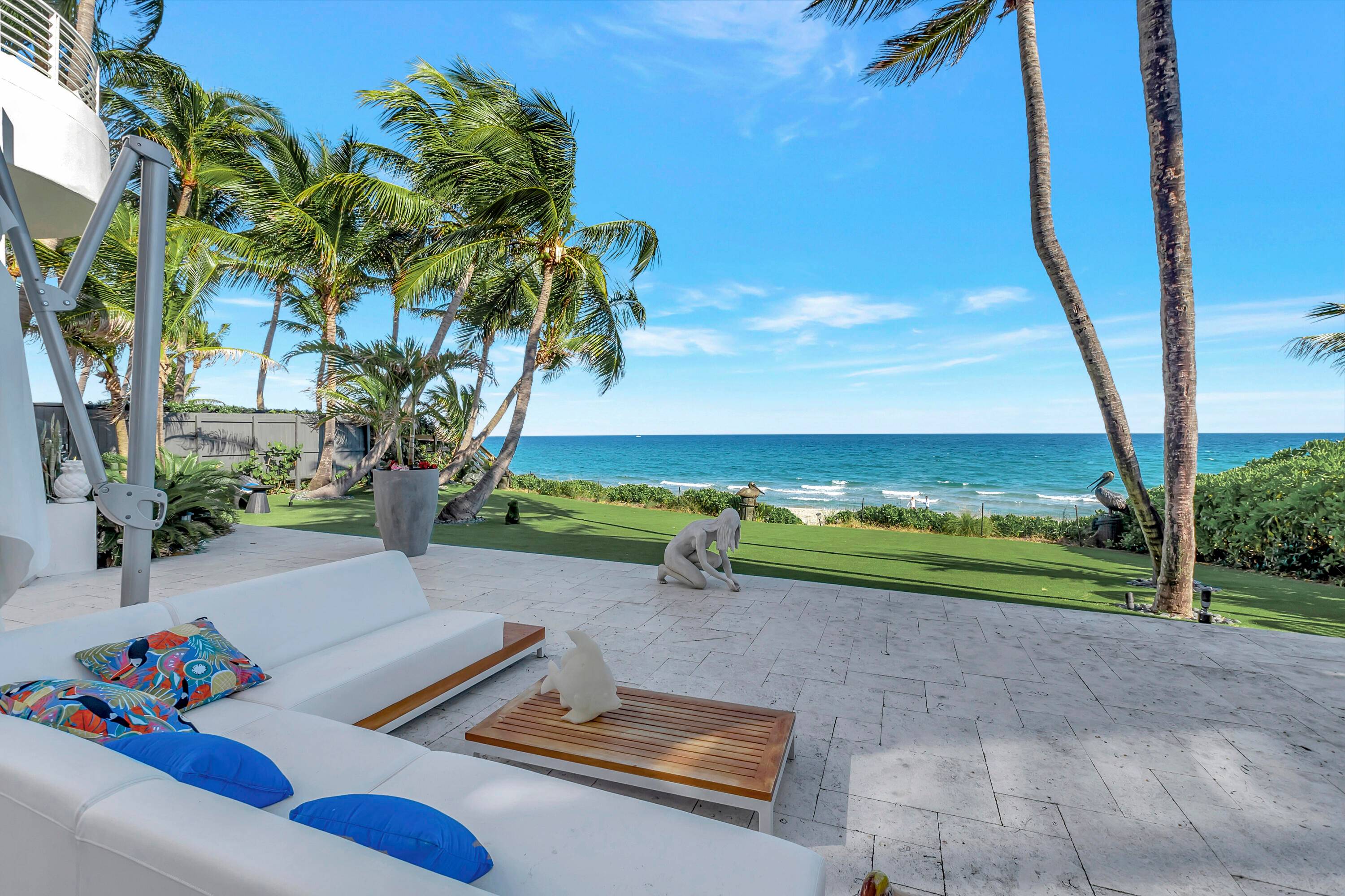 THIS DIRECT OCEANFRONT CONTEMPORARY SINGLE FAMILY HOME BOASTS BREATHTAKING OCEAN VIEWS.